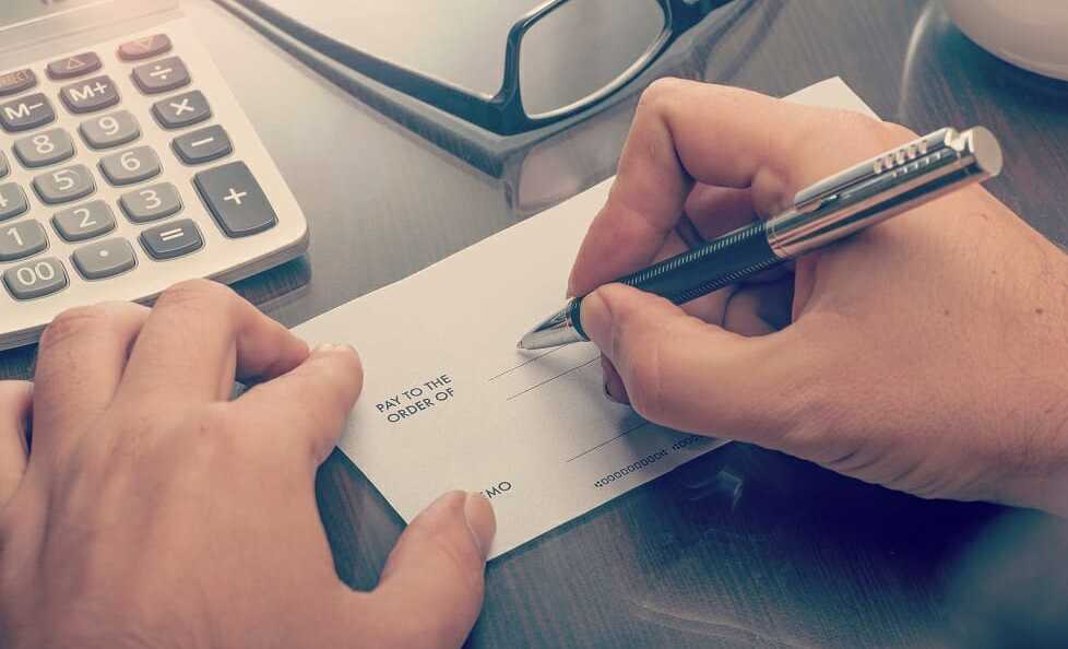 How to Write a Check - Hands on a Check