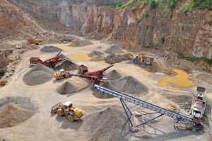 Mining Industry - Image of heavy equipment in a mining pit